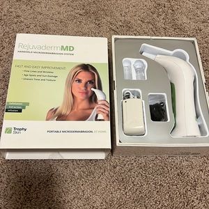 Rejuvaderm MD - handheld microdermabrasion system